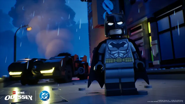 Batman beside the Batmobile in a Gotham City street